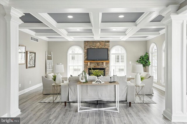 6624 Aaron Mee Way, Baltimore, MD 21237 - living room featuring ornate columns, baseboards, wood finished floors, beam ceiling, and coffered ceiling