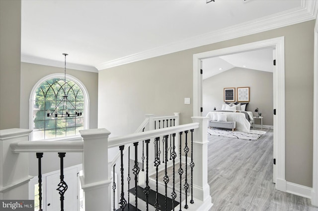 6624 Aaron Mee Way, Baltimore, MD 21237 - hall with an upstairs landing, light wood-style flooring, ornamental molding, and baseboards