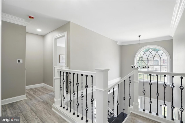 6624 Aaron Mee Way, Baltimore, MD 21237 - hall featuring an upstairs landing, ornamental molding, wood finished floors, and baseboards