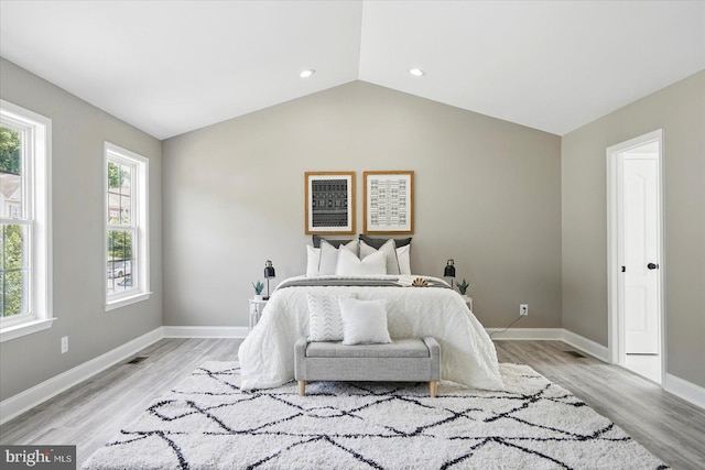 6624 Aaron Mee Way, Baltimore, MD 21237 - bedroom with light wood finished floors, baseboards, lofted ceiling, and recessed lighting