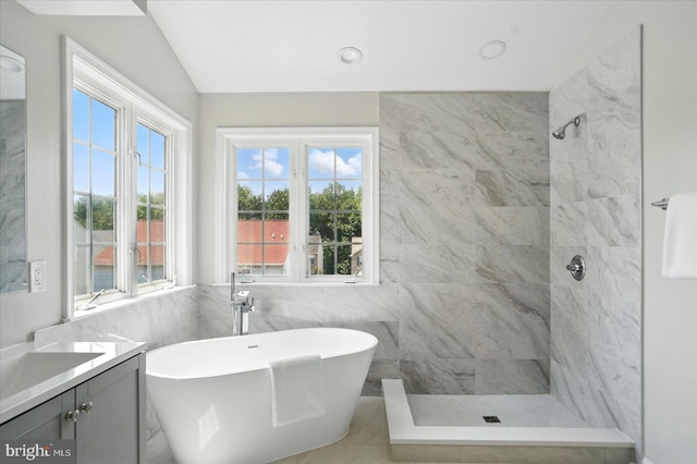 6624 Aaron Mee Way, Baltimore, MD 21237 - full bath featuring a tile shower, a freestanding bath, tile walls, vanity, and healthy amount of natural light