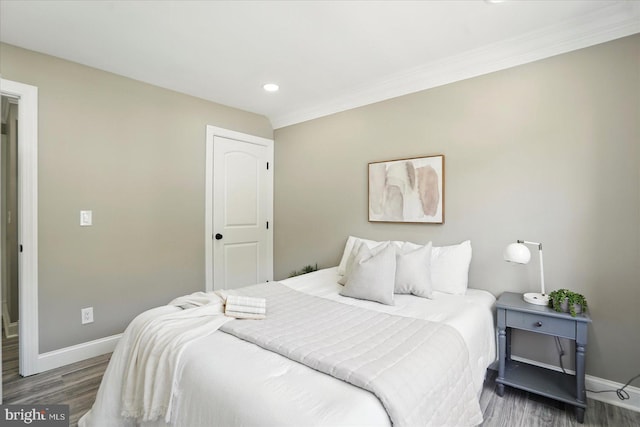 6624 Aaron Mee Way, Baltimore, MD 21237 - bedroom featuring wood finished floors, baseboards, ornamental molding, and recessed lighting