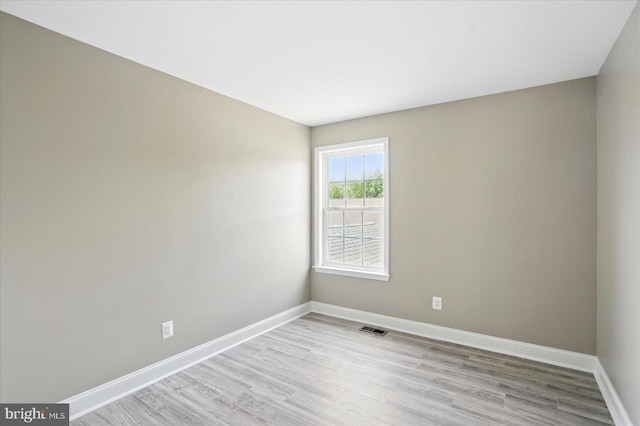 6624 Aaron Mee Way, Baltimore, MD 21237 - spare room featuring light wood-style floors and baseboards