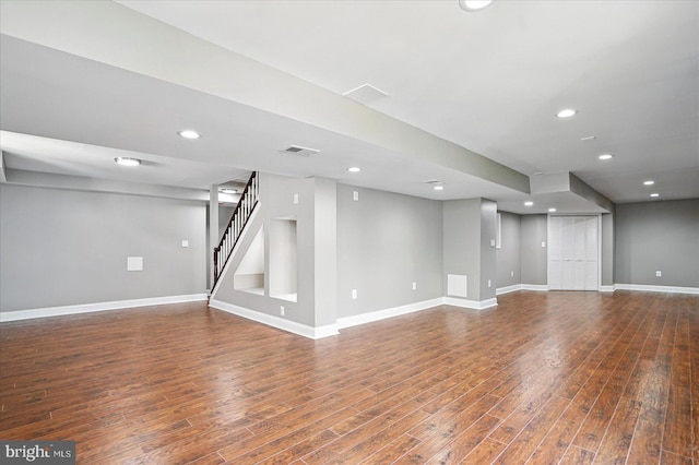 6624 Aaron Mee Way, Baltimore, MD 21237 - finished below grade area featuring wood finished floors, stairs, baseboards, and recessed lighting