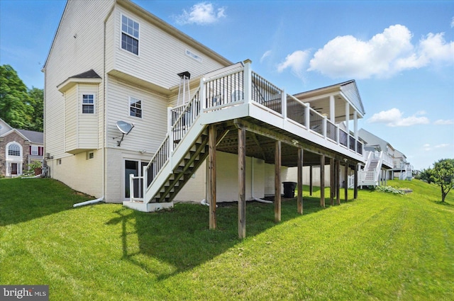 6624 Aaron Mee Way, Baltimore, MD 21237 - rear view of house with stairway, a wooden deck, and a lawn