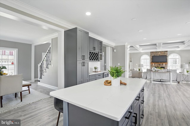 6624 Aaron Mee Way, Baltimore, MD 21237 - kitchen with gray cabinetry, recessed lighting, light wood-style floors, baseboards, and ornamental molding