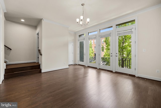 42289 Porter Rdg, Brambleton, VA 20148 - unfurnished dining area featuring a chandelier, baseboards, stairway, dark wood finished floors, and recessed lighting
