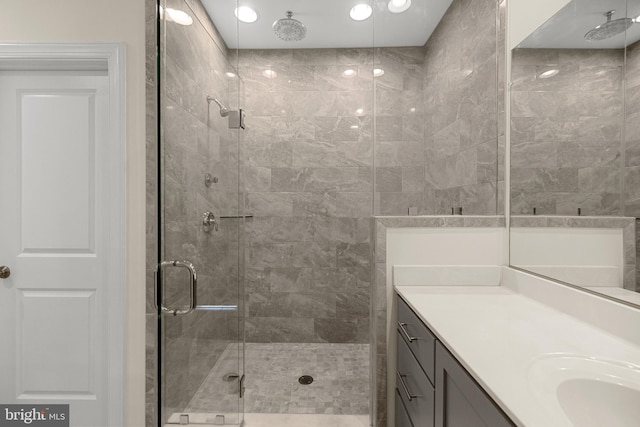 42289 Porter Rdg, Brambleton, VA 20148 - bathroom featuring a shower stall and vanity