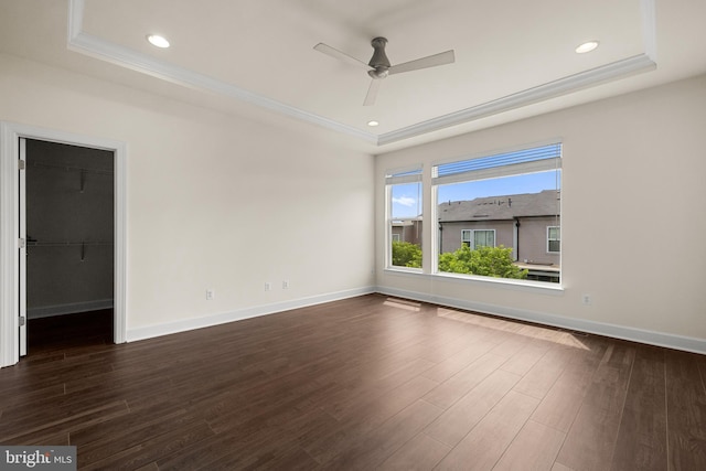 42289 Porter Rdg, Brambleton, VA 20148 - empty room with a tray ceiling, a ceiling fan, ornamental molding, dark wood-type flooring, and baseboards