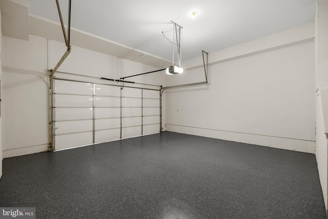 42289 Porter Rdg, Brambleton, VA 20148 - garage featuring a garage door opener