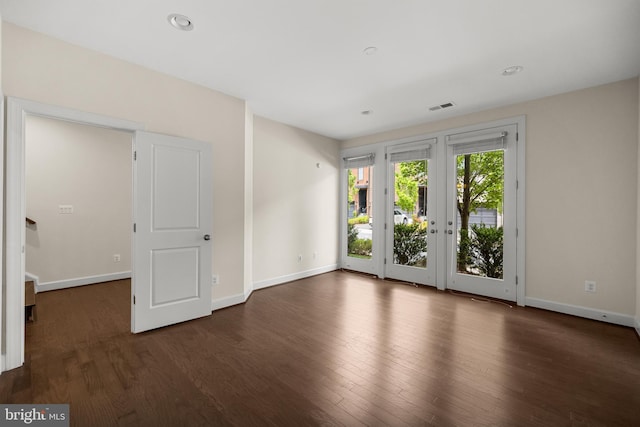 42289 Porter Rdg, Brambleton, VA 20148 - unfurnished room featuring french doors, dark wood-style floors, baseboards, and recessed lighting