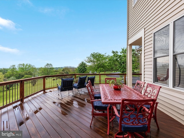 deck featuring outdoor dining space