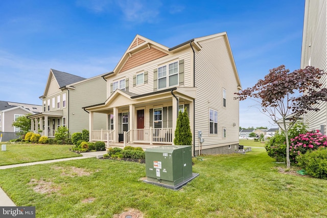view of front of house featuring a porch and a front lawn