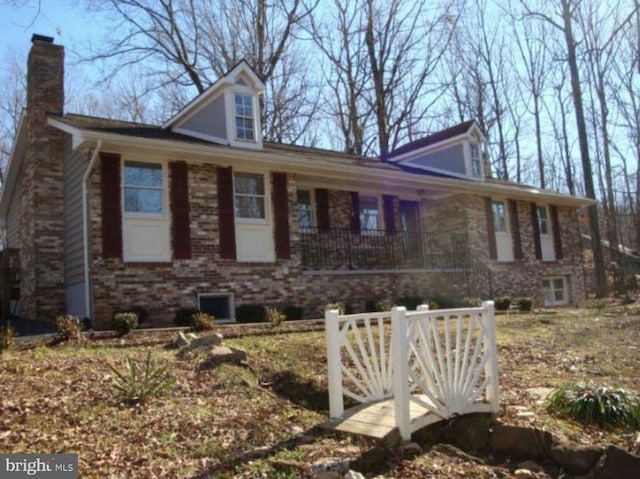 view of front of property with a chimney