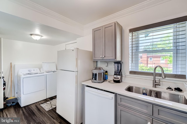 6328 Martin Luther King Jr Hwy, Capitol Heights, MD 20743 - kitchen with white appliances, a sink, washer and clothes dryer, gray cabinetry, and ornamental molding