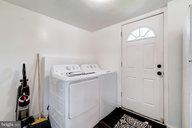 6328 Martin Luther King Jr Hwy, Capitol Heights, MD 20743 - washroom featuring independent washer and dryer and dark wood-style flooring