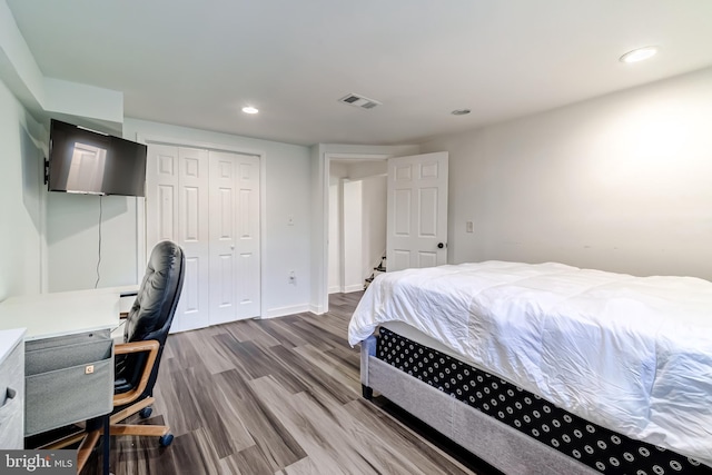 6328 Martin Luther King Jr Hwy, Capitol Heights, MD 20743 - bedroom with wood finished floors, a closet, recessed lighting, a desk, and baseboards