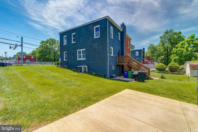 6328 Martin Luther King Jr Hwy, Capitol Heights, MD 20743 - back of property featuring a chimney, stairs, a deck, and brick siding