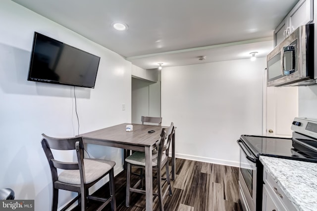6328 Martin Luther King Jr Hwy, Capitol Heights, MD 20743 - dining area featuring dark wood-style flooring, baseboards, and recessed lighting