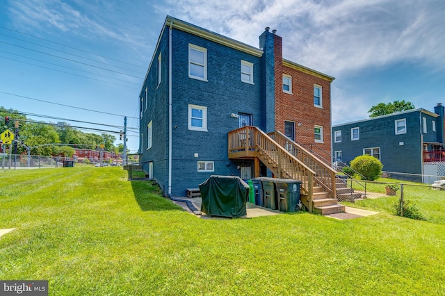 6328 Martin Luther King Jr Hwy, Capitol Heights, MD 20743 - back of house with a chimney, brick siding, and stairway