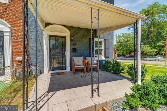 6328 Martin Luther King Jr Hwy, Capitol Heights, MD 20743 - view of exterior entry featuring brick siding and a porch