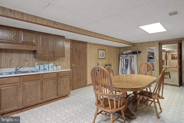 3731 Long Point Dr, York, PA 17402 - dining space with light floors, wood walls, and a drop ceiling