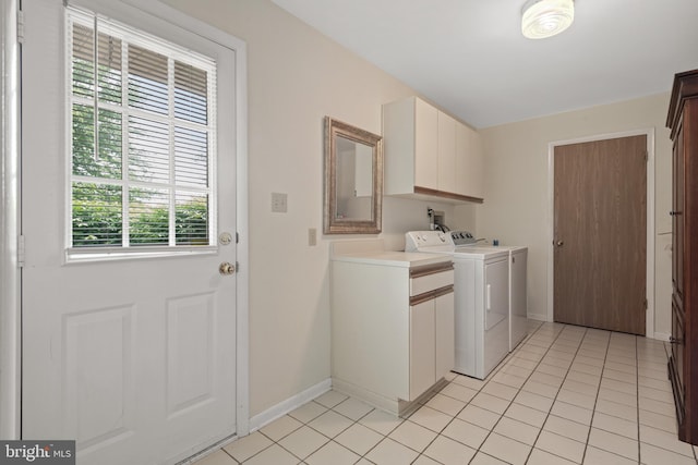 3731 Long Point Dr, York, PA 17402 - washroom featuring cabinet space, light tile patterned floors, washing machine and clothes dryer, and baseboards