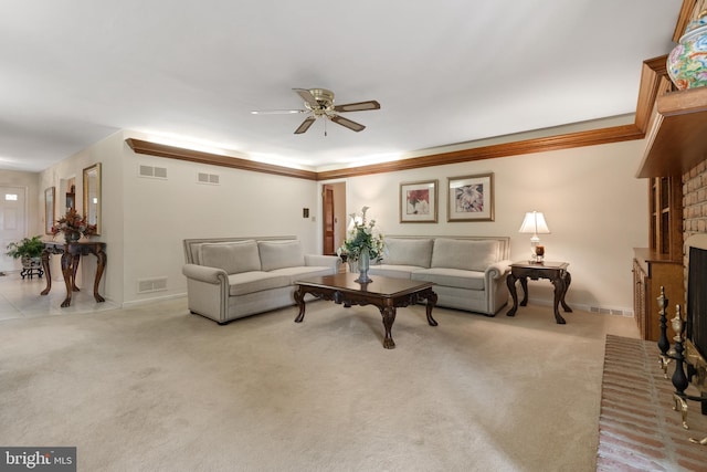 3731 Long Point Dr, York, PA 17402 - living room with ceiling fan, a brick fireplace, carpet flooring, baseboards, and crown molding