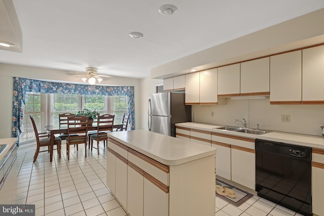 3731 Long Point Dr, York, PA 17402 - kitchen with dishwasher, a sink, freestanding refrigerator, a ceiling fan, and light countertops