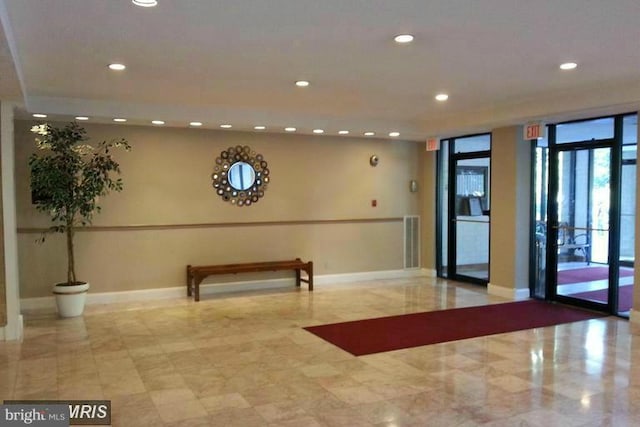 building lobby featuring recessed lighting