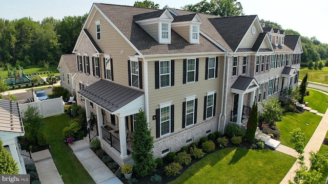 16 Magpie Ln, Princeton Junction, NJ 08550 - view of front of home featuring a front yard and brick siding