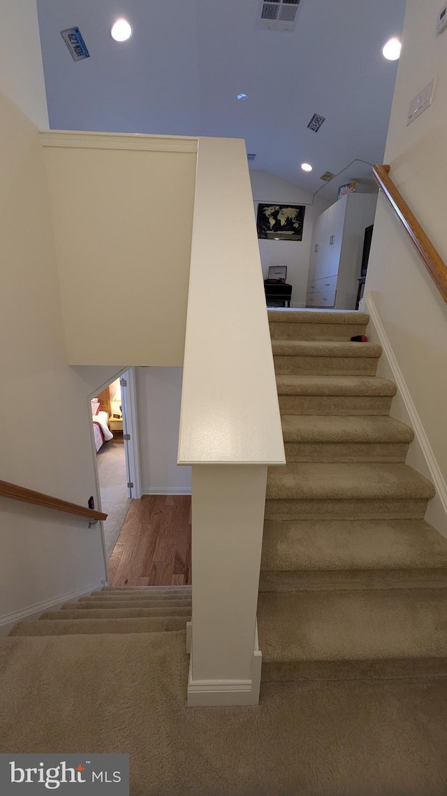 16 Magpie Ln, Princeton Junction, NJ 08550 - stairway featuring recessed lighting, lofted ceiling, and wood finished floors