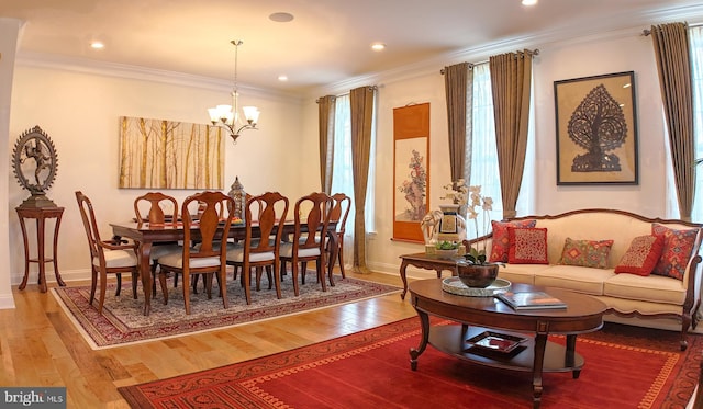 16 Magpie Ln, Princeton Junction, NJ 08550 - dining space featuring plenty of natural light, a chandelier, light wood-style floors, ornamental molding, and recessed lighting
