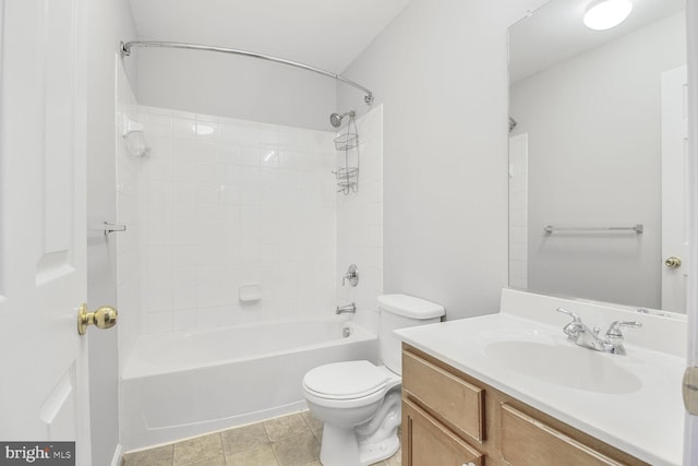 bathroom with toilet, vanity, and shower / bathtub combination