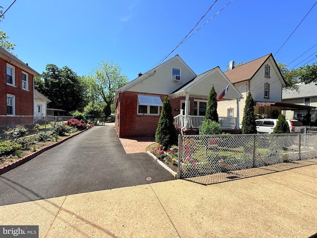 418 N 8th St, Vineland, NJ 08360 - bungalow-style home featuring fence and brick siding