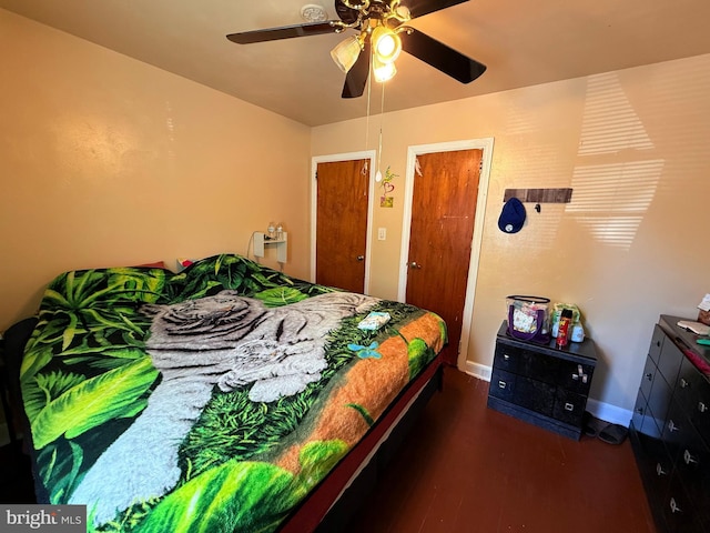 418 N 8th St, Vineland, NJ 08360 - bedroom with baseboards, wood finished floors, and ceiling fan