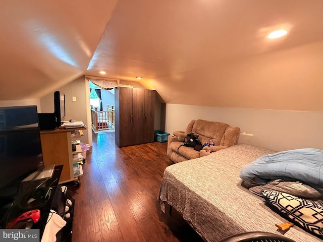 418 N 8th St, Vineland, NJ 08360 - bedroom with wood-type flooring and lofted ceiling