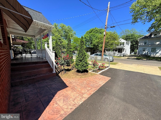 418 N 8th St, Vineland, NJ 08360 - view of patio featuring a porch
