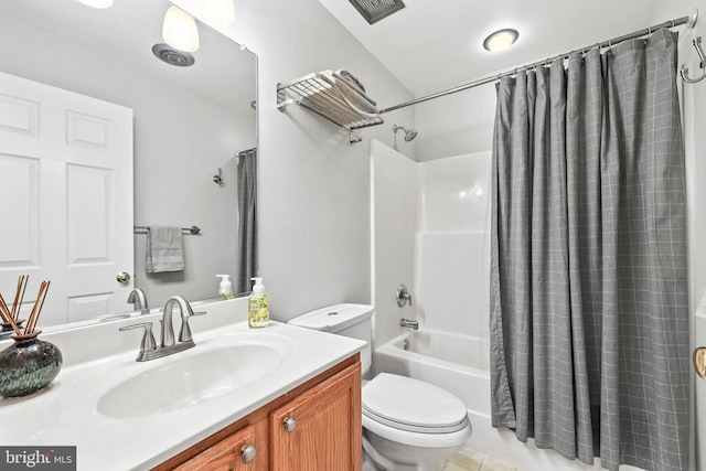 full bath featuring toilet, shower / bath combination with curtain, vanity, and tile patterned floors