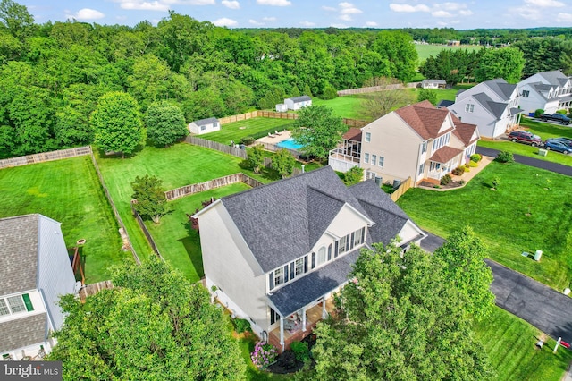 drone / aerial view of a heavily wooded area