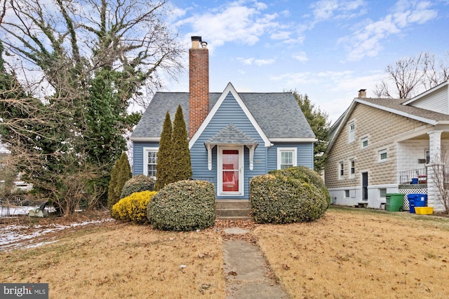 5100 Eugene Ave, Baltimore, MD 21206 - view of front of property with a chimney and roof with shingles