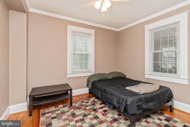 5100 Eugene Ave, Baltimore, MD 21206 - bedroom featuring wood finished floors, baseboards, crown molding, and ceiling fan
