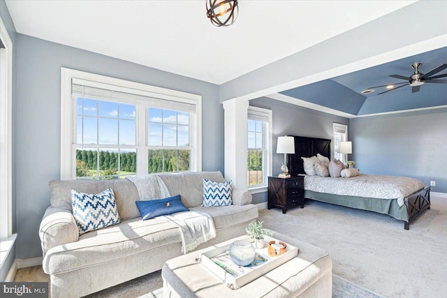 carpeted bedroom featuring baseboards and a ceiling fan