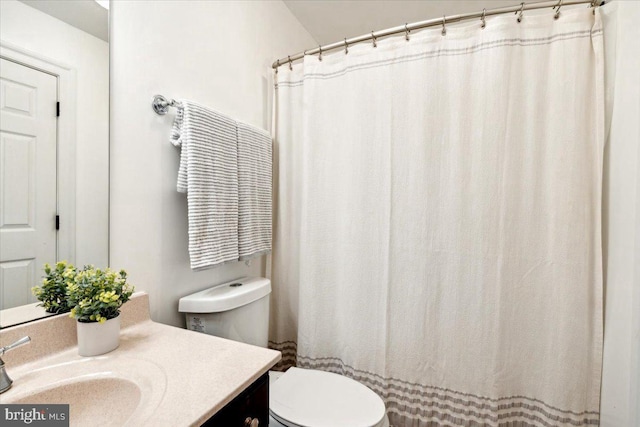 full bath featuring toilet and vanity