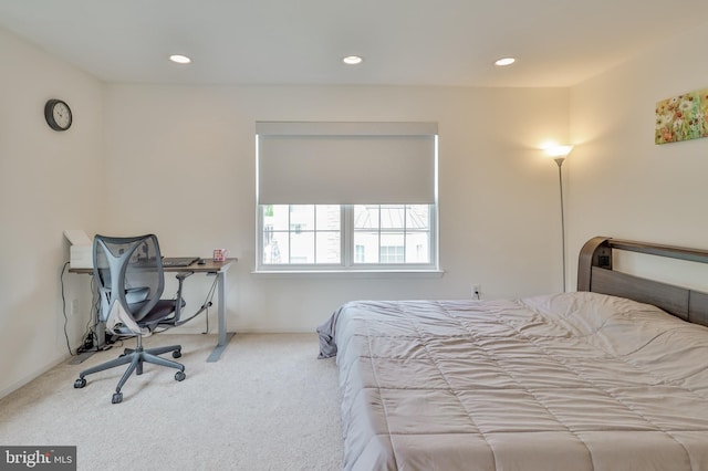carpeted bedroom featuring recessed lighting