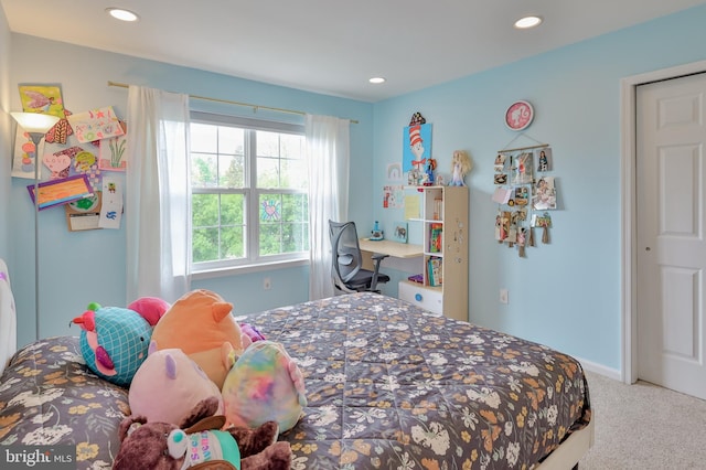 carpeted bedroom featuring recessed lighting and baseboards