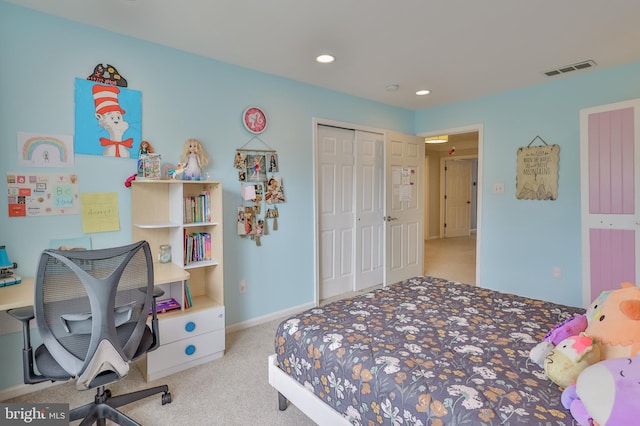 carpeted bedroom with a closet, baseboards, and recessed lighting