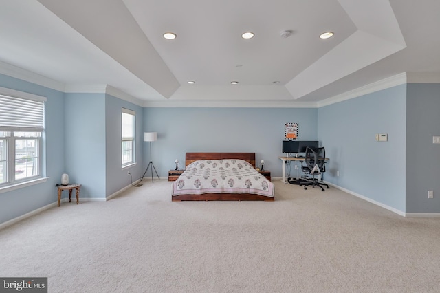carpeted bedroom featuring crown molding, baseboards, recessed lighting, and a raised ceiling