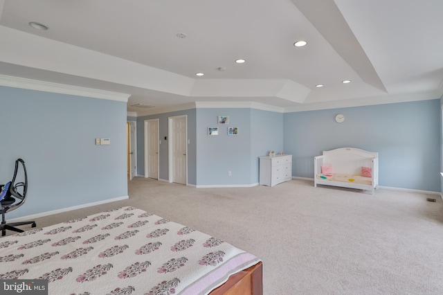 bedroom with carpet flooring, ornamental molding, baseboards, recessed lighting, and a tray ceiling
