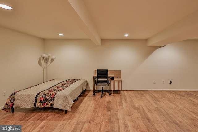 bedroom featuring recessed lighting, wood finished floors, and baseboards